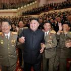 North Korean leader Kim Jong Un reacts during a celebration for nuclear scientists and engineers...