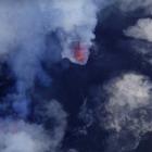 A cloud of smoke from Manaro Voui volcano is seen on Vanuatu's northern island Ambae. Photo:...