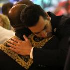 People mourn during an interfaith memorial service for victims of the Route 91 music festival...