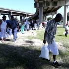 New Orleans residents fill sand bags in preparation for Tropical Storm Nate on in New Orleans,...