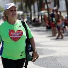 Ivonette Balthazar (67) walks near Copacabana beach in Rio de Janeiro. Photo: Reuters