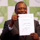 Incumbent President Uhuru Kenyatta holds the certificate of President-Elect of the Republic of...