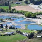 Graham Lee and wife Hayley have spent millions of dollars developing a salmon fishing complex...