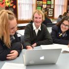 Otago Girls' High School pupils (from left) Amy Duffy and April Merriman (both 16) make the most...