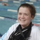 Neptune swimmer Erika Fairweather (13) yesterday with 29 national medals she has won this year at...