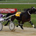Titan Banner flies home to win the 80th running of the Hannon Memorial at Oamaru yesterday for...