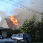 A chimney fire roared out of control in Wanaka last night, fully involving the house. Photo:...