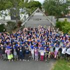 Sawyers Bay School pupils show how large their school has grown during the past five years. Photo...