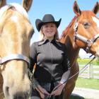 Ranfurly teen Amanda Voice relaxes with her horses Slider (left) and Wade. The 15-year-old has...