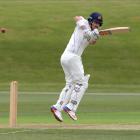 Otago opener Hamish Rutherford plays a shot off his legs on his way to a century in his side's...
