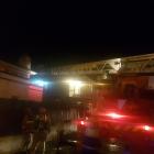 Firefighters outside a student flat this evening. Photo: Vaughan Elder