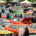 Hundreds of cars pack into the Crescent Rugby Football Club grounds on Saturday.  Photo: Richard...