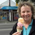 Jumbo Dairy manager Debbie Green eyes up an ice cream which has been kept cold thanks to the use...