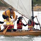 Vicky Liu (left), Anderson Yu, Anne-Marie Jackson, Ruby Hsiao and Cuki Liu paddle the Hauteruruku...