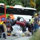 The scene after yesterday‘s head-on collision between a school bus  and a compact SUV on Frankton...