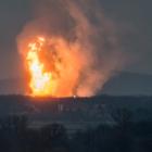 A column of fire is seen after an explosion ripped through Austria's main gas pipeline hub in...