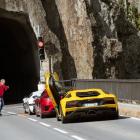 Jeremy Clarkson chats to fellow hosts Richard Hammond and James May before they enter a tunnel in...