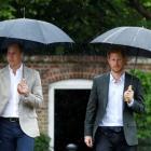 Britain's Prince William, Duke of Cambridge and Prince Harry visit the White Garden in Kensington...