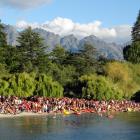 Hundreds of people gathered on the beach at Queenstown Bay on Christmas Day. Photo: Louise Scott