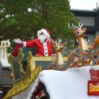 Santa and his reindeer make a triumphant appearance at the end of the Dunedin Christmas parade....
