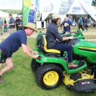 Kent Mackenzie pushes former Southland Farm Machinery group marketing co-ordinator Steph Munro as...