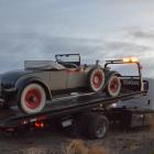 Craig and Nicky Marshall's 1928 Packard Roadster is towed to Los Angeles after breaking down on...