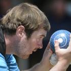 Ryan Burnett lines up the jack during men's singles play in the national championships at the...