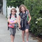 Quinn (7) and Marita (9) Fischer prepare to start school in the sweltering heat of Dunedin. PHOTO...
