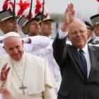Pope Francis and Peru's President Kuczynski wave, in Lima. Photo: Reuters