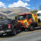 Glen Collins' tow truck was bumped into a stationary Holden Colorado after a tourist driver...