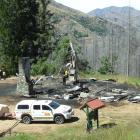 All that remains of the historic Mount Aurum Homestead are two chimneys and charred roofing iron. 