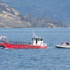 A barge and small boat were used to set up specialised sonar equipment yesterday in the hope of...