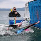Stefannie Gillespie reaches for the finishing line to beat Australian Kate Dryden and win the...