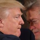 President Donald Trump talks to chief strategist Steve Bannon during a swearing in ceremony for...