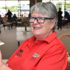 Vicki Graf, of Mosgiel, with a plate of cheese rolls, just some of the food available for nearly...