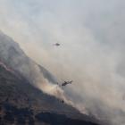 The At Alpha fire near Wanaka at its peak, with up to eight choppers in the air at once fighting...