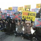 South Korean people attend a protest opposing Vice chairman of the North Korean ruling party's...
