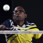 Dev Senthiya  is all concentration during the  badminton at the New Zealand Masters Games...