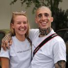 With his girlfriend Elena Engelharet, Romanian-born Catalin Onc hopes to pass on a positive...