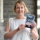 Dunedin author Ella West with her new novel Rain Fall, a teenage murder mystery set in Westport....