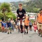 Harry Willis pogos up Baldwin St. Photo: ODT