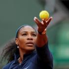 Serena Williams prepares to serve against Magdalena Rybarikova.  Photo Reuters