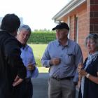 Minister for Agriculture Damien O’Connor (second from left) talks with DairyNZ Southland/South...