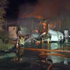 A firefighter tackles the blaze at Wastebusters in September 2015. Photo ODT files