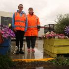 Wastebusters site manager Lauree O'Neil and shop assistant Val Joyce stand on the site of the...