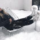 Cardrona Alpine Resort staff member Carly Parker enjoys yesterday's snow-fall. Photo: Supplied