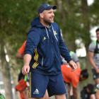 Highlanders scrum coach Clarke Dermody gets ready for training at Logan Park yesterday. Photo:...