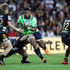 Waisake Naholo makes a break during the round seven Super Rugby match between the Chiefs and the...