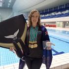 Kathryn Nevatt with her  treble of medals from the Pan Pacific Freediving Championships in Tokyo....