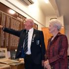 Bill Grey points to his name on the honours board while inspecting some of the memorabilia with...